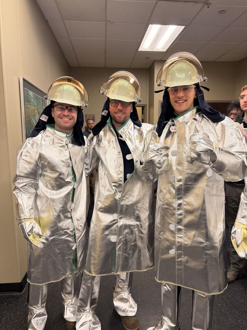 Manufacturing entrepreneurs Zach Glabman, Jack Watson, and Daniel Scott Mitchell suit up for their first metal pour at Erie Bronze & Aluminum Co. during METAL’s Penn State, Behrend bootcamp.