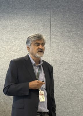 Dr. Uday Vaidya speaks to a crowd.